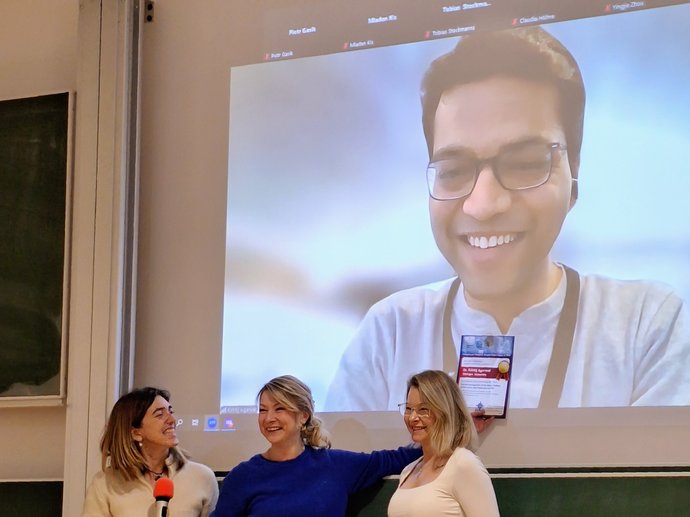 Award ceremony for Dr. Kshitij Agarwal, who was connected to the CBM Collaboration Meeting. Award ceremony for Dr. Kshitij Agarwal, who was connected to the CBM Collaboration Meeting.