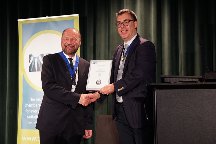 Award: Professor Marco Durante (left) with BIR president Dr. Nicholas Screaton. Award: Professor Marco Durante (left) with BIR president Dr. Nicholas Screaton.